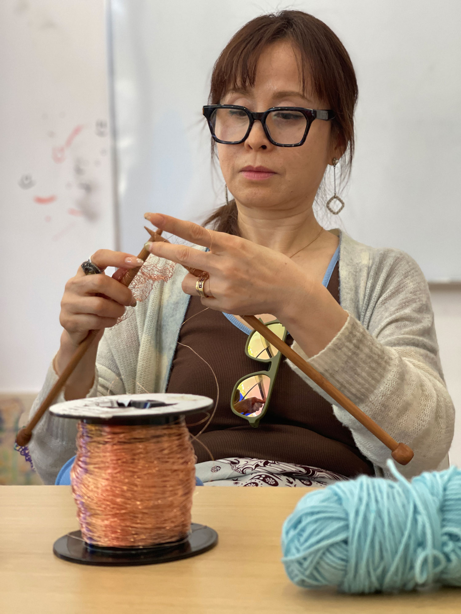 student-knitting